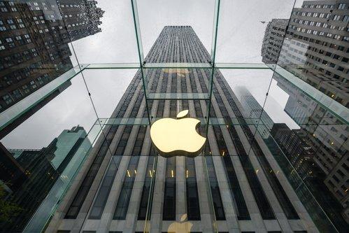 NEW YORK, USA - May 04, 2016: Apple Store logo at the entrance to the Apple Store on Fifth Avenue New York. Apple Store cube on 5th Avenue on a cloudy rainy day