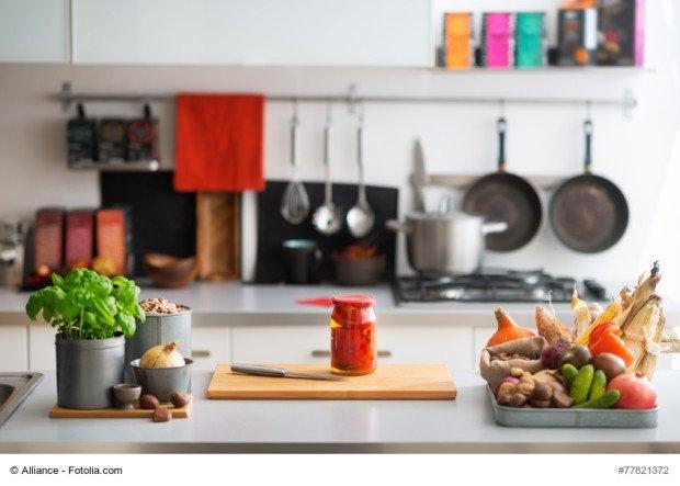 Closeup on table with vegetables in kitchen 