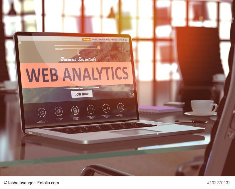 Web Analytics Concept. Closeup Landing Page on Laptop Screen on background of Comfortable Working Place in Modern Office. Blurred, Toned Image. 3d Render.