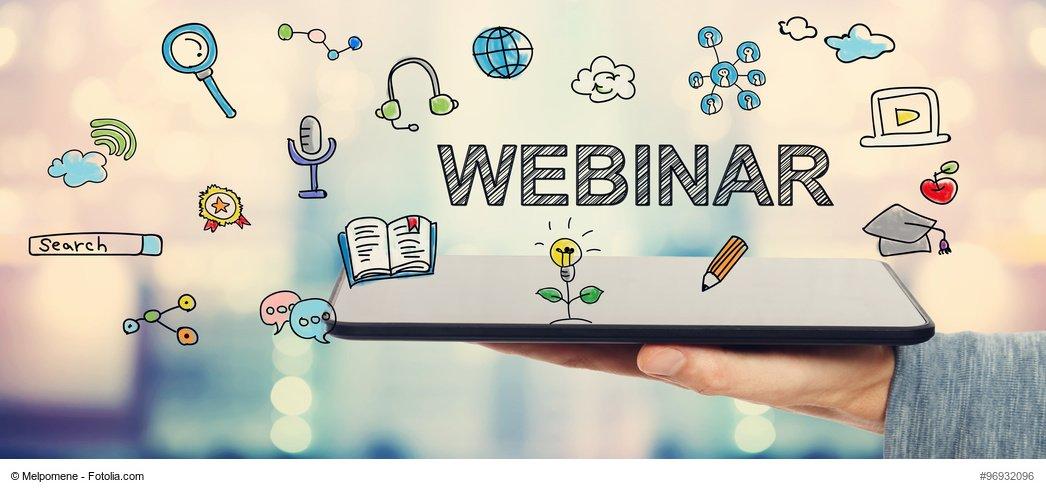 Webinar concept with man holding a tablet computer
